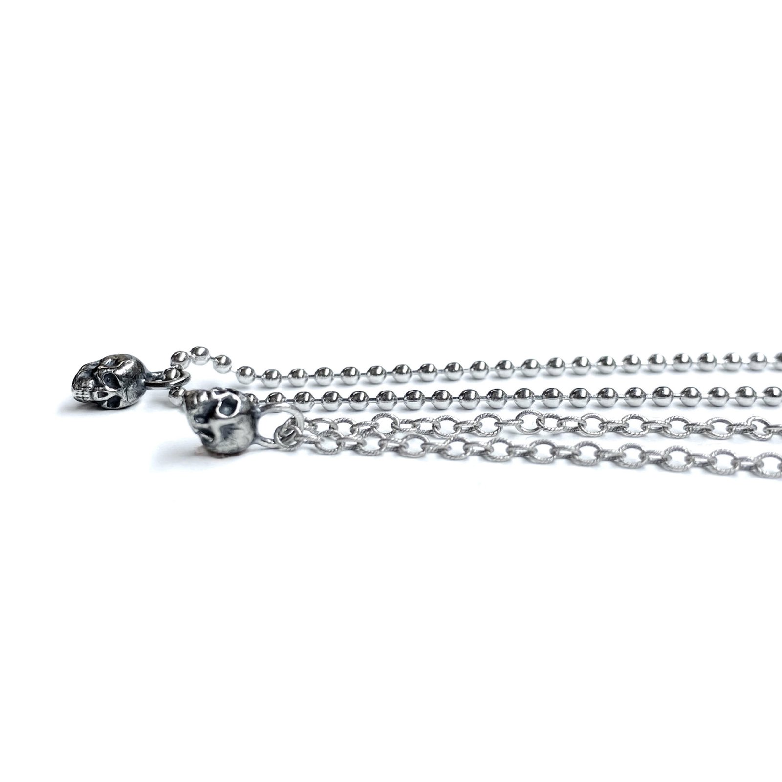 Tiny Skull pendant necklace in sterling silver or gold Tiny Skull pendant necklace in sterling silver or gold
